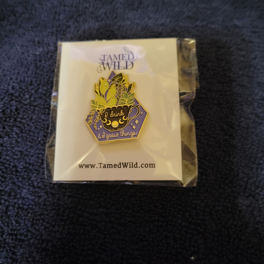 Tamed Wild pin